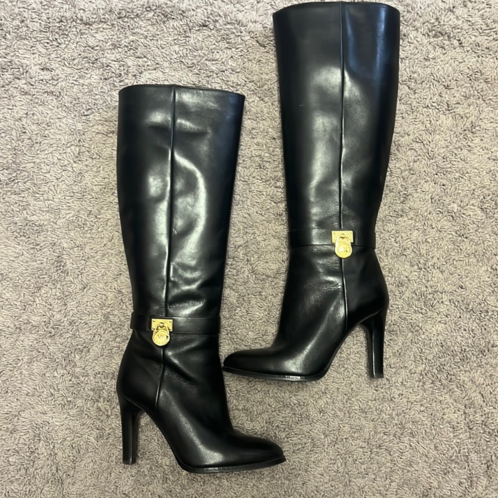 6.5 Michael Kors black leather boots. Worn once and in great condition.